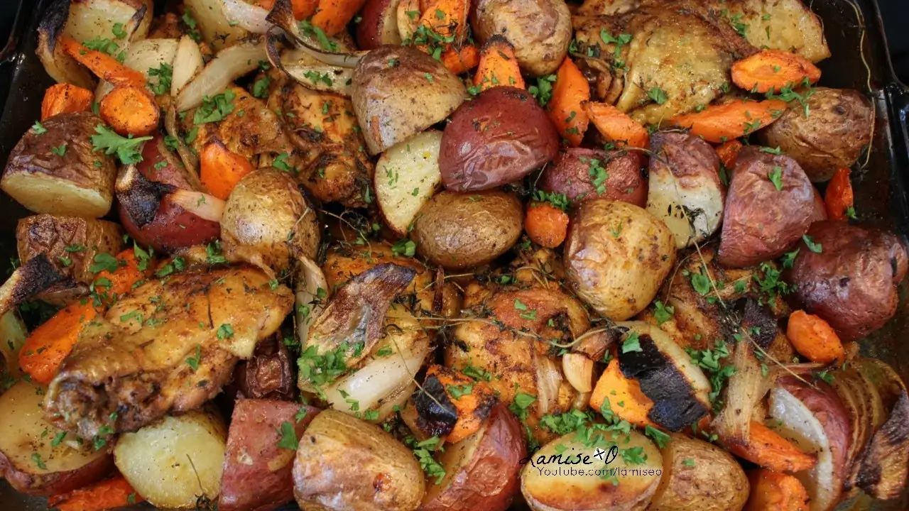 A tray of roasted vegetables and diced chicken, illustrating a hearty Diced Chicken Recipe.